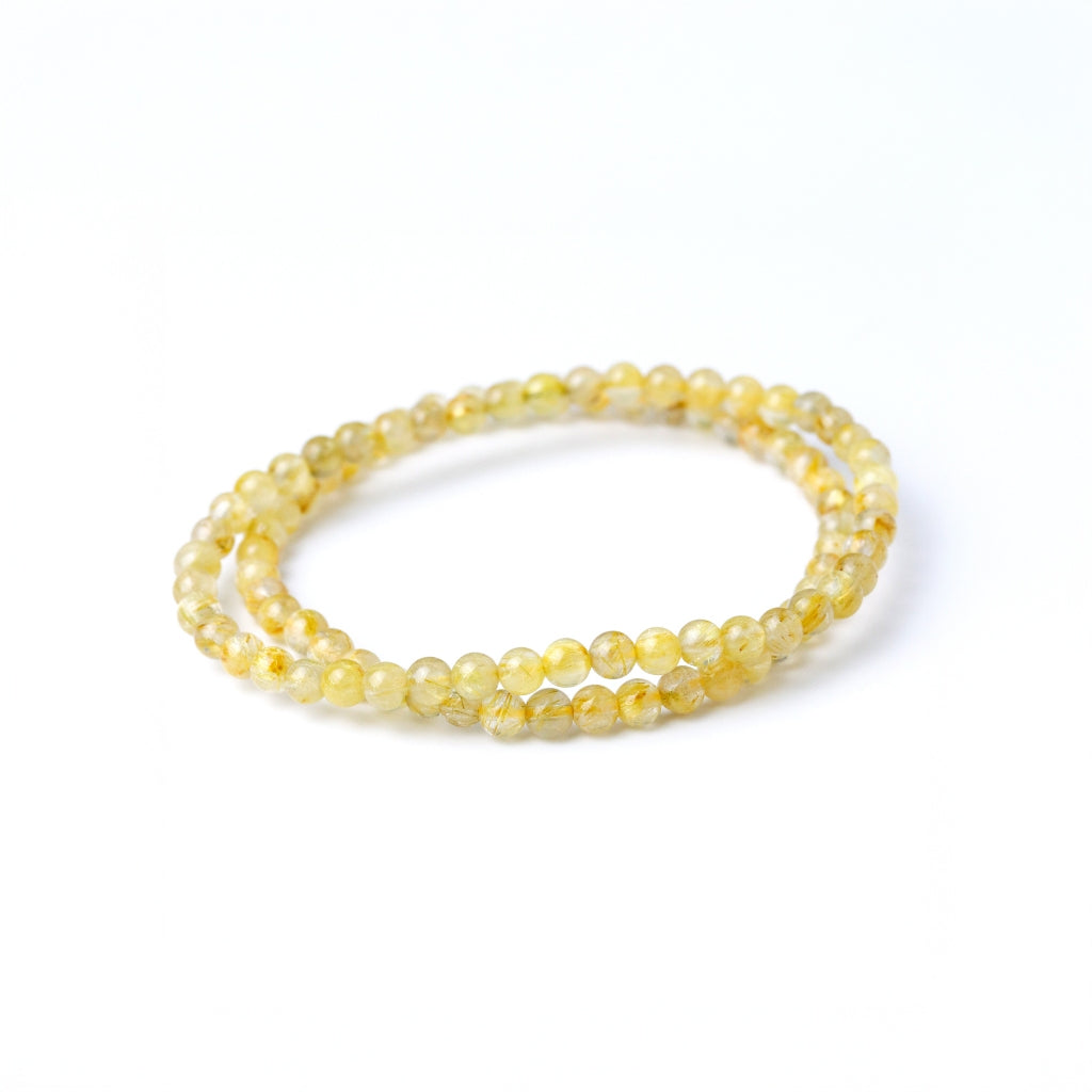 LUCY SUMMER กำไลข้อมือทหินแท้ ไหมทอง (Rutilated Quartz) ขนาด 4 มม.