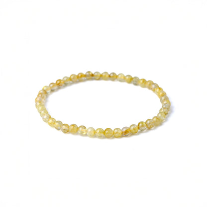 LUCY SUMMER กำไลข้อมือทหินแท้ ไหมทอง (Rutilated Quartz) ขนาด 4 มม.