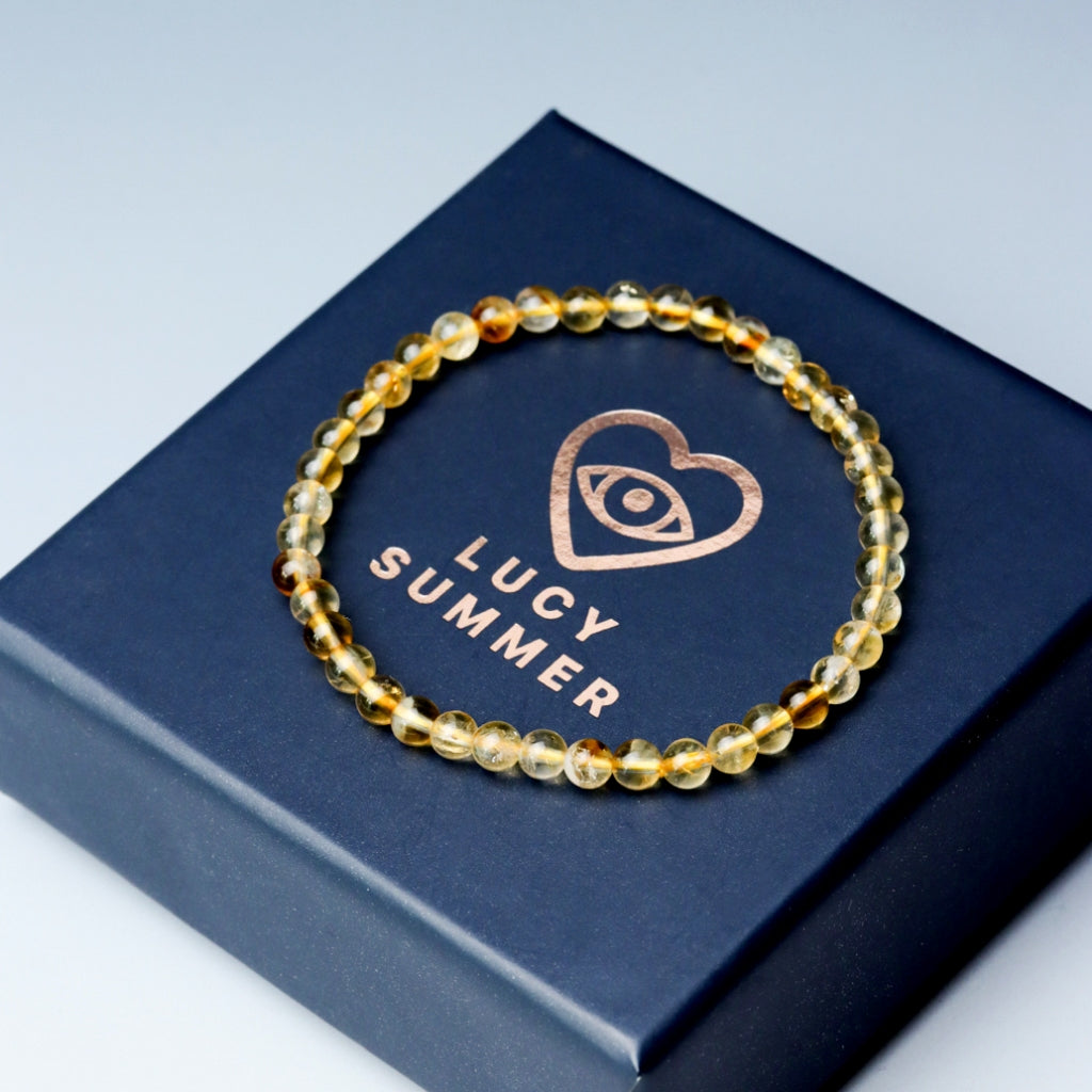 LUCY SUMMER กำไลข้อมือหินแท้ Citrine (ซิทรีน) ขนาด 6 mm.