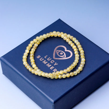 LUCY SUMMER กำไลข้อมือทหินแท้ ไหมทอง (Rutilated Quartz) ขนาด 4 มม.