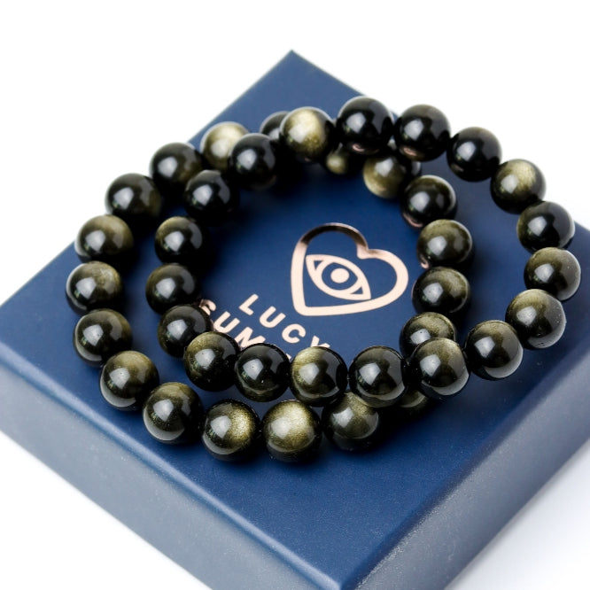 LUCY SUMMER กำไลข้อมือหินแท้ Golden Obsidian ขนาด 10 มม  - ออบซิเดียน เหลือบทอง (กำไลหินแท้ รับประกันหินแท้)