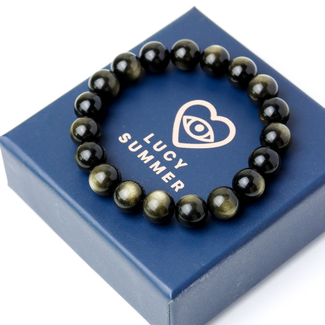 LUCY SUMMER กำไลข้อมือหินแท้ Golden Obsidian ขนาด 10 มม  - ออบซิเดียน เหลือบทอง (กำไลหินแท้ รับประกันหินแท้)