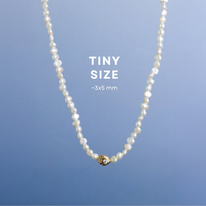 LUCYSUMMER Ivory Pearl Necklace สร้อยคอไข่มุก รูปทรงธรรมชาติ พร้อมจี้สีทองฝังเพชร CZ